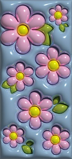 some pink and yellow flowers are floating in the water