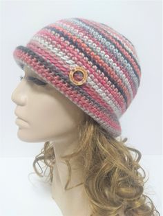 Stylish, retro woman hat, a colorful, fancy hat made of wool, style bucket hat. Very warm and cozy, becasue it's made of wool and acrylic. The majority of wool (60%) in the yarn gives You warmth and softness, the acrylic (40%) prevents from itchiness and makes the item durable. The hat is very comfortable in many ways - soft, fancy, warm, and You can put it in Your bag when it's necessary and it won't rumple or loose it's shape.  The hat in the foto fits a standard woman's head circumference 54-56 cm, it's rather an M-size, it's about 22cm high with the brim. Please let me know if You wish Your hat in other size. I will be happy to crochet it for You :-) Hand wash using a detergent for woolen clothes, do not use any bleach, or fabric softeners. Remember to dry your hat flat and don't let i Multicolor Brimmed Cloche Hat, Multicolor Curved Brim Cloche Hat For Winter, Multicolor Winter Cloche Hat With Short Brim, Multicolor Winter Cloche Hat With Curved Brim, Handmade Yarn Cloche Hat, Retro Crochet Yarn Hat, Retro Yarn Beanie Hat, Retro Handmade Crochet Hat For Winter, Handmade Retro Crochet Hat For Winter