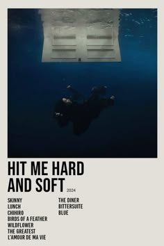 a man floating in the water next to an advertisement for hit me hard and soft