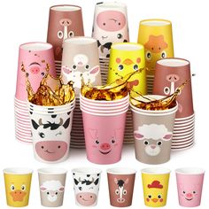 many different colored cups with faces on them