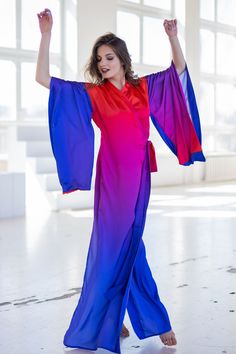 "Satin kimono dress with color transitions in purple and red Light and airy \"Wings\" sewn into the sleeves, which complement the airy image of the dress ➤ Features > dress length: 58,5 inches / 148cm cm ➤ Sizing My Size Guide in FAQ section below will help you define the perfect size match. The item can also be made according to your measurements - just message them to me. ➤ Delivery Your item is made-to-order and will be ready within 2-7 days. Average delivery times: > North America: up Vibrant Spring Dress With Kimono Sleeves, Multicolor Fitted Dress With Kimono Sleeves, Fitted Multicolor Dress With Kimono Sleeves, Spring Bohemian Ombre Dresses, Fitted Red Summer Kimono, Red Flowy Dress With Kimono Sleeves, Red Dress With Kimono Sleeves For Party, Long Purple Festival Dress, Long Purple Dress For Festival