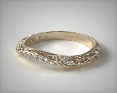 a wedding band with diamonds on it