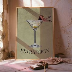 an extra dirty martini poster is sitting on the floor