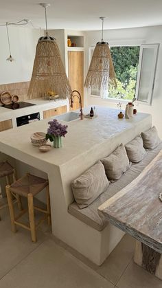 a large kitchen island with seating in it