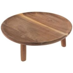 a wooden table with two legs and a small round plate on the top that is made out of wood