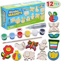 wooden magnets are shown in front of a box with paint and play dough on it