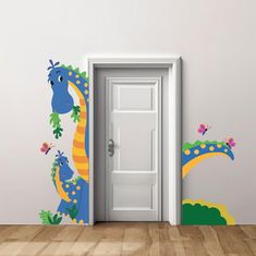 an open door in a white room with colorful wall decals