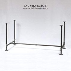 an image of a black metal rack with two poles