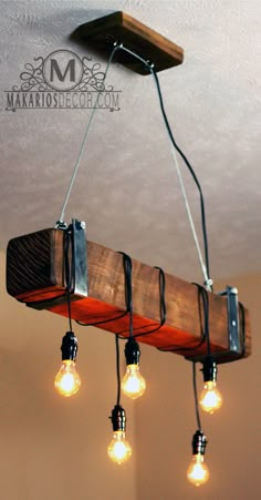 a wooden beam with lights hanging from it