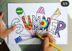 a person is drawing the word summer with colored pencils and paper on a table