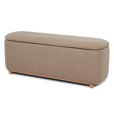 an upholstered bench with wooden legs and a light brown fabric cover on it