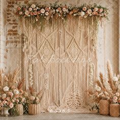 the backdrop is decorated with flowers and greenery