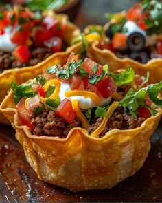 some taco cups are sitting on a table