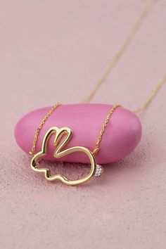 Dainty Easter Bunny Charm Necklace, Gold Diamond Rabbit Necklace for Mom, Easter Necklace Jewelry Gift for Her, Pet Lover Gift Rabbits symbolize sensitivity, gentleness, fertility, new beginnings, and good luck FEATURES * Solid Gold (real gold, not gold plated or gold filled material) * Gold Karat: 10K (417) - 14K (585) - 18K (750) (optional) * Pendant Height: 0.60 Inches (1.53 cm) * Pendant Width: 0.77 Inches (1.95 cm) * Available Gold Color: Yellow gold, rose gold and white gold (optional) * D Kids Jewelry Gold, Necklace Gold Diamond, Easter Necklace, Hand Jewelry Rings, Kids Jewellery, Bunny Jewelry, Rabbit Necklace, Rabbit Jewelry, Gold Initial Pendant