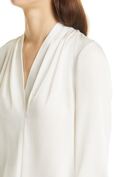 A stretch-kissed silk blouse adds a lustrous layer and an elegant drape to whatever your day (or night) has in store. Style Name:Kobi Halperin Nellie Stretch Silk Blouse. Style Number: 6241719. Fitted Silk Pre-draped Blouse, Elegant White Viscose Top, Elegant Cream Silk Blouse, Fitted Silk Chiffon Formal Top, Fitted Silk Crepe Evening Tops, Formal Fitted Silk Chiffon Top, Cream Silk Evening Blouse, Silk Cream Evening Blouse, Cream Silk Blouse For Evening