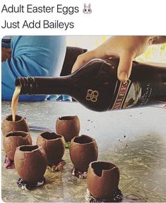 an image of someone pouring some chocolate eggs into small vases for them to drink