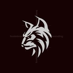 a black and white wolf head on a dark background