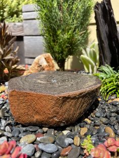 a large rock sitting on top of a pile of rocks