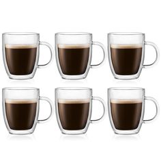 six glass coffee mugs filled with liquid