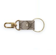 100% authentic Gucci canvas repurposed into a boujee key chain. Makes keeping up with your keys easier with the swivel hook to attach to your purse, belt loop. etc. Perfect gift for yourself or someone special. Measures 5″ in total length DISCLAIMER: Beaudin is not affiliated or associated with Gucci or its subsidiaries. We buy authentic, pre-owned designer material obtained legally from second-hand market and add it to our designs and accessories. All items listed are not products manufactured Gucci Key Wallet, Boujee Keychain, Lv Key Chains, Luxury Keychain With Key Leash, Gucci Key Rung, Sparkle Top, Hair Socks, Casual Bodysuit, Swivel Hook