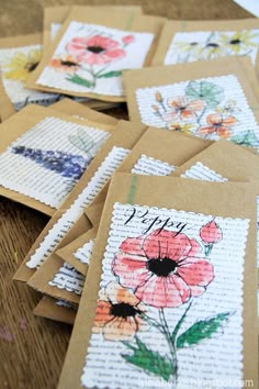 some cards with flowers on them and the words happy written in each other's letters