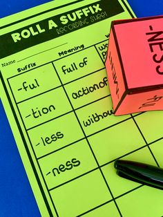 a roll a sudfx game sitting on top of a blue table