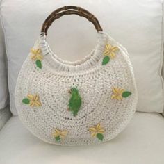 From My 2021 Resort Collection, This Handbag Is White Woven Raffia With A Handmade / Hand Painted Ceramic Tropical Green Bird, Painted Cowrie Shells And Embroidered Tropical Leaves. Fully Lined With Interior Pocket. One Of A Kind! Nwt Summer White Top Handle Shoulder Bag, White Top Handle Shoulder Bag For Summer, Spring Cream Bag With Bamboo Handle, Cream Bags With Bamboo Handle For Spring, White Top Handle Crochet Bag For Shopping, White Top Handle Shoulder Bag For Vacation, White Top Handle Summer Bag, White Rectangular Straw Bag With Bamboo Handle, White Straw Bag With Bamboo Handle