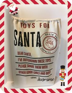 a santa sack with toys for santa written on it and a nutcracker figurine next to it