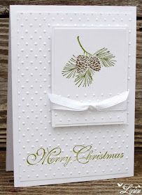 a white christmas card with pine cones on it