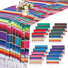 the table cloths are multicolored and have fringed edges