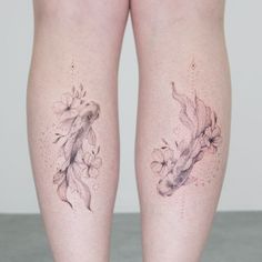 the legs of a woman with tattoos on them are covered in watercolor pencils