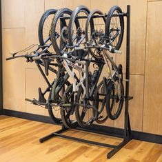 freestanding 5 bike rack Bike Organization, Standing Bike Rack, Freestanding Bike Rack, Vertical Bike Rack, Bike Storage Garage, Bike Storage Rack, Vertical Bike, Bicycle Sport, Installing Siding