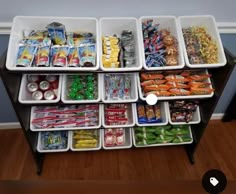 an organized food storage unit in the corner of a room