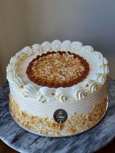 a cake sitting on top of a marble table