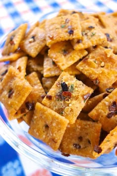 a plate full of crackers with raisins on them