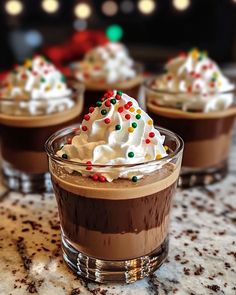 Indulge in the festive spirit with these Christmas Chocolate Kahlua & Baileys Pudding Shots! Perfect for holiday gatherings, this easy recipe combines rich flavors of Red Velvet Baileys and coffee liqueur with creamy chocolate pudding. Just mix, fill, and chill for a delightful treat that will impress your guests. Don’t forget to top with festive sprinkles for that extra holiday cheer! Prep in just 10 minutes and enjoy a sweet moment with loved ones this season. Christmas Chocolate Kahlua Pudding Shots, Christmas Chocolate Kahlua And Baileys Pudding Shots Recipe, Baileys Pudding Shots, Baileys And Coffee, Holiday Pudding