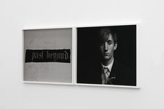 two black and white photos hanging on the wall next to each other, one with a man's face