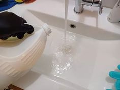 a faucet that is pouring water into a sink