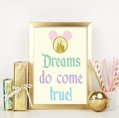 there is a framed poster with the words dreams do come true and mickey mouse on it