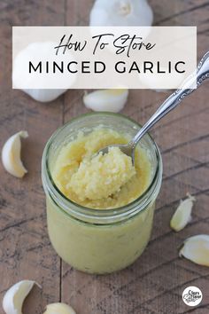 an image of how to store minced garlic in a glass jar with a spoon