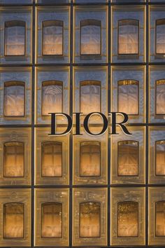 the word dior is displayed in front of windows