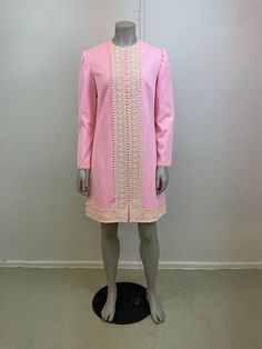 Women's Vintage 1960's Mod Shift Dress. Pastel pink with ric-rack details. Crazy cute! Fits about a modern Medium, in great vintage condition. Zipper back, long sleeves, adorable! Measured flat and in inches. Double where needed or compare to a dress that fits you well. Pit to pit - 19 in Waist - 18.5 in Hips - 20.5 in Length shoulder to hem - 36 in Pink Mini Vintage Dress For Spring, Vintage Pink Mini Length Dress, Pink Fitted A-line Vintage Dress, Pink Vintage Dress For Daywear, Retro Pink A-line Dress, Fitted Vintage Pink Dress Lined, Fitted Pink Vintage Dress With Lining, Pink Fitted Vintage Dress With Lining, Vintage Pink A-line Dress