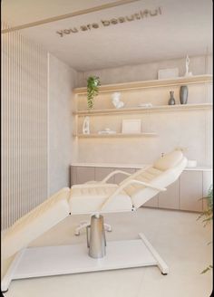 a white chair sitting on top of a table in a room