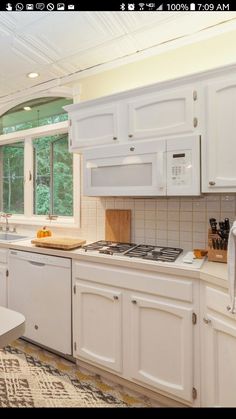 the kitchen is clean and ready for us to use in its new owner's home