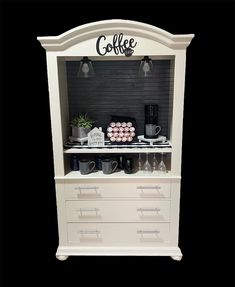 the coffee bar is decorated with black and white decor