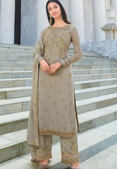 Buy Indian Wedding Lehenga grey georgette embroidered straight trouser suit 18091 online in USA, UK and Canada from KollyBollyEthnics.com Plazo Designs Latest Style, Heavy Duppata, Suits Latest Design, Tops On Jeans, Suites Designs, Plazo Suit Design, Plazo Design, Plazo Designs, Latest Designer Kurtis