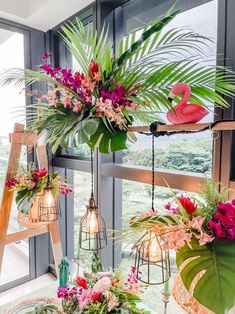 flowers and plants are hanging from the window sill in front of an open - air room