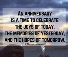 two glasses of champagne being toasted with the words an anniversary is a time to celebrate the joys of today, the memories of yesterday, and the hopes of tomorrow