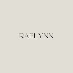 the word raelynn written in black ink on a gray background with an image of a