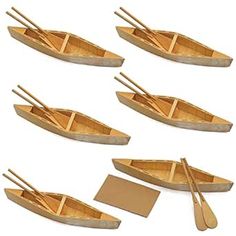 six wooden boats with oars and paddles